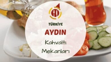 Aydın'da bahçe ortamında hazırlanmış zengin serpme kahvaltı tabağı ve çay bardakları