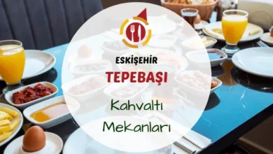 Tepebaşı semtinde serpme kahvaltı tabağı ve çay bardakları ile dolu bir masa